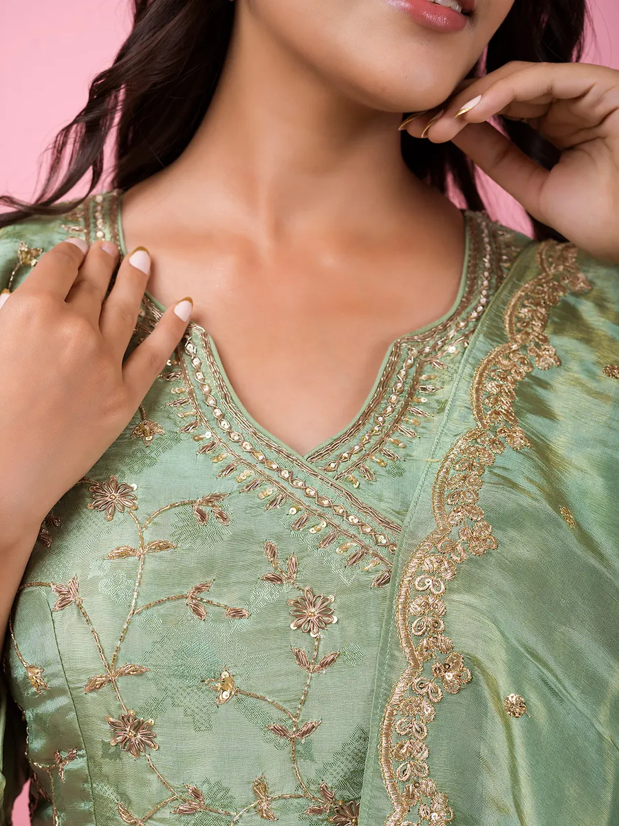 Elegant pista green tissue silk anarkali suit