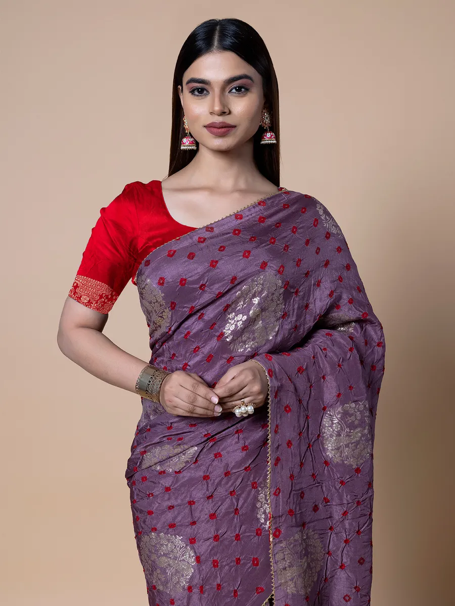 Festive wear purple bandhej saree