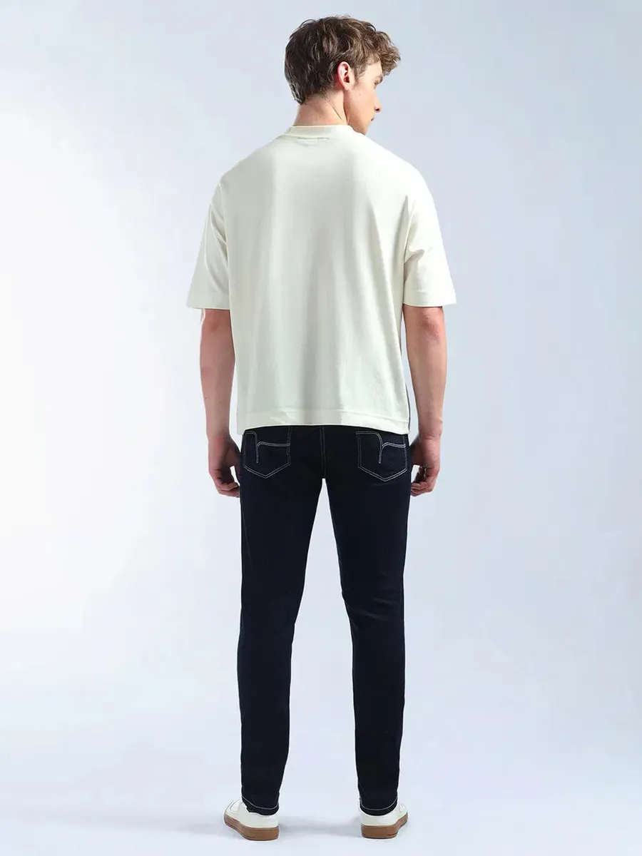 FLYING MACHINE solid dark navy slim tapered denim