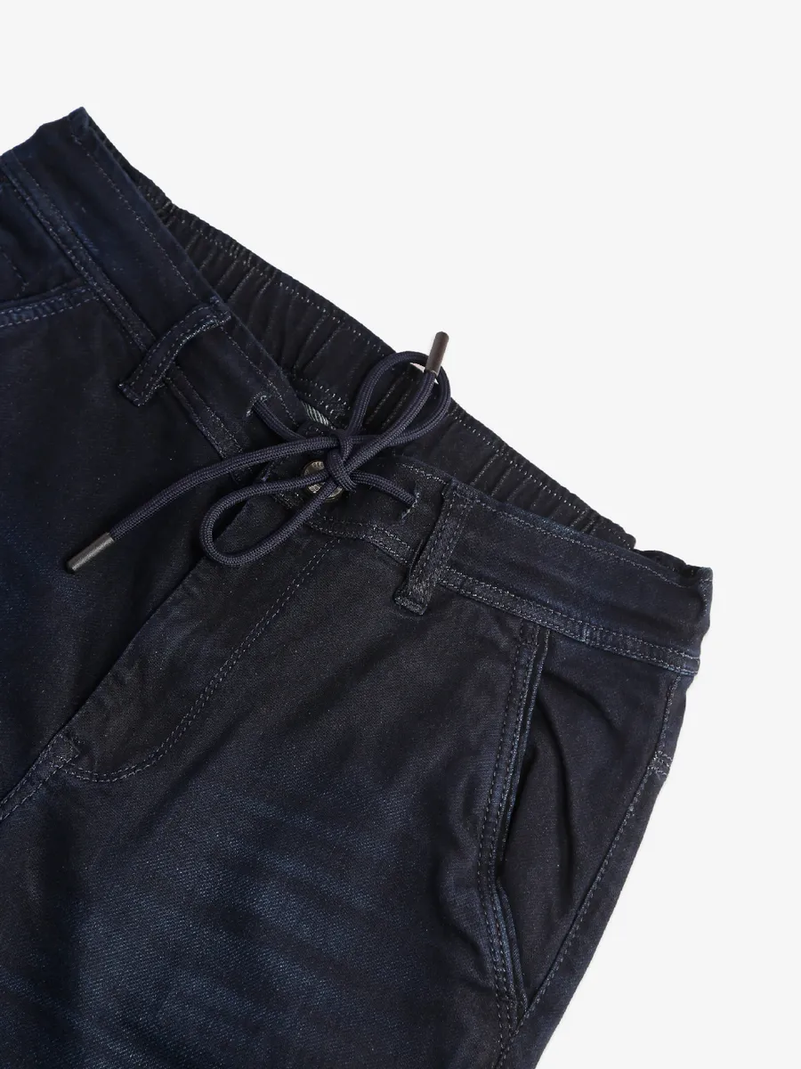 Gesture washed navy jeans