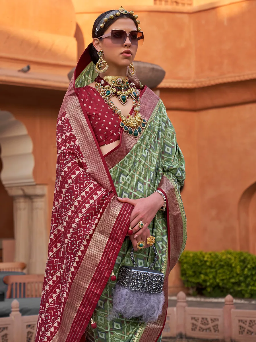 Green cotton silk saree with contrast border