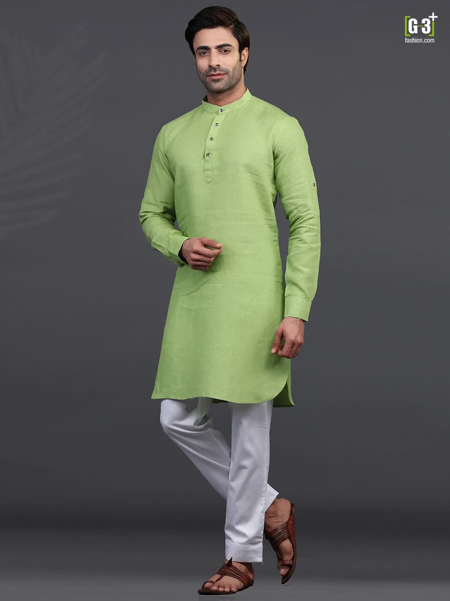 Green linen kurta suit for festive wear