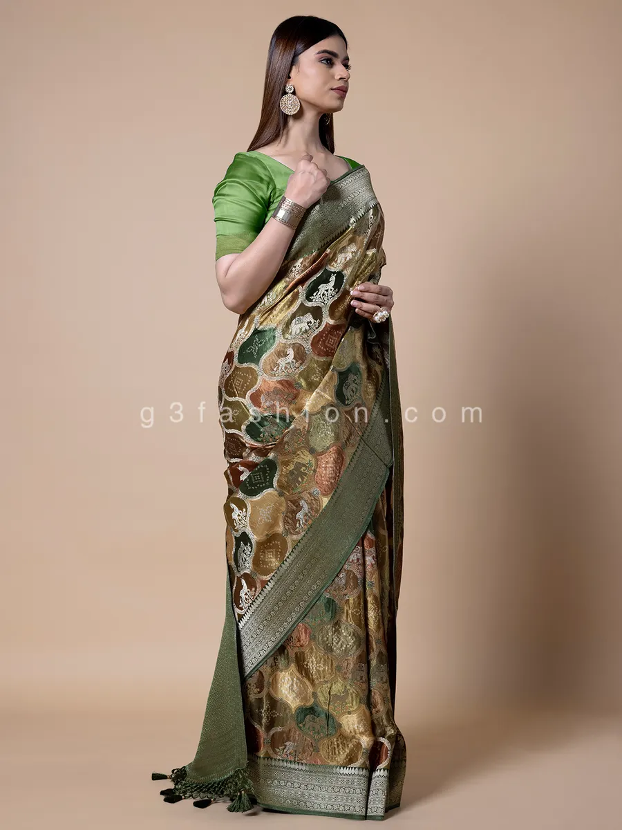 Green shaded dola silk zari weaving saree