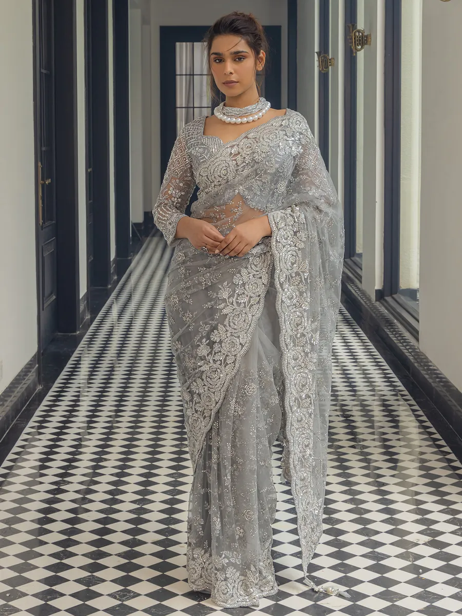 Grey net saree with sequins work