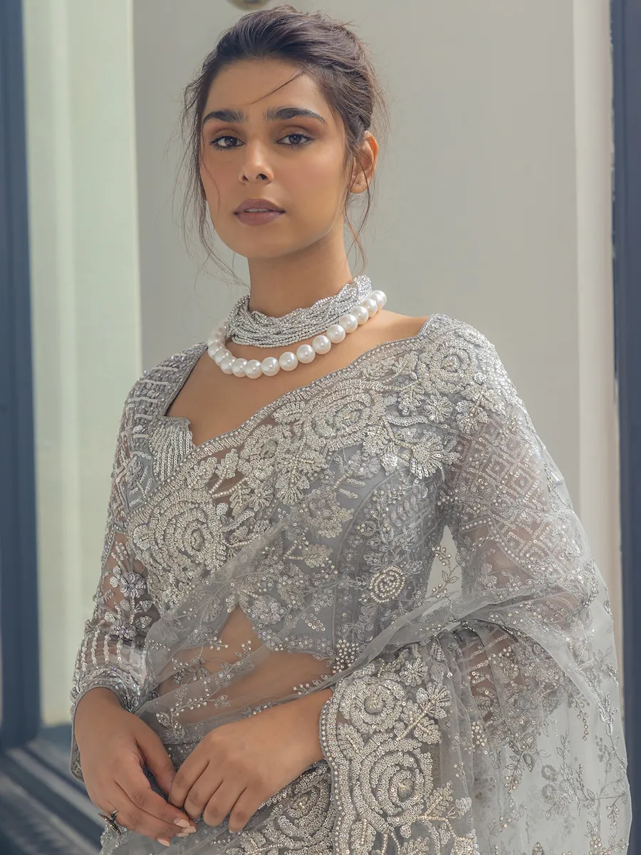 Grey net saree with sequins work