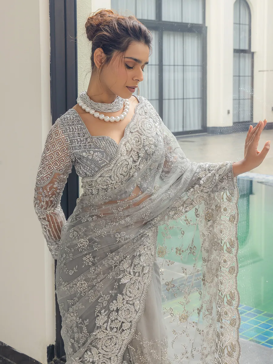 Grey net saree with sequins work