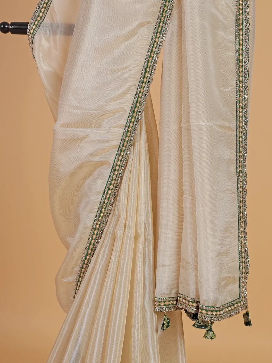 Latest cream tissue silk saree