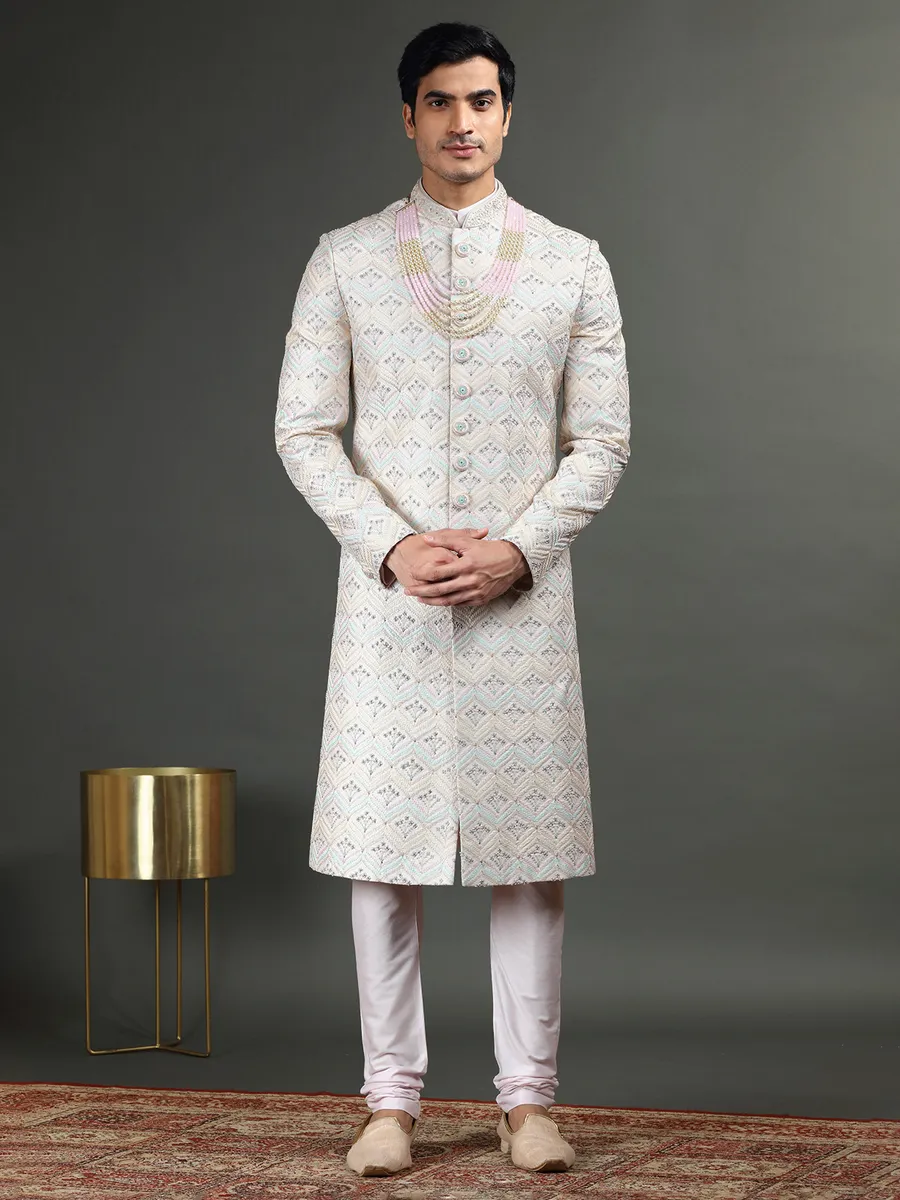 Lavish light pink raw silk sherwani