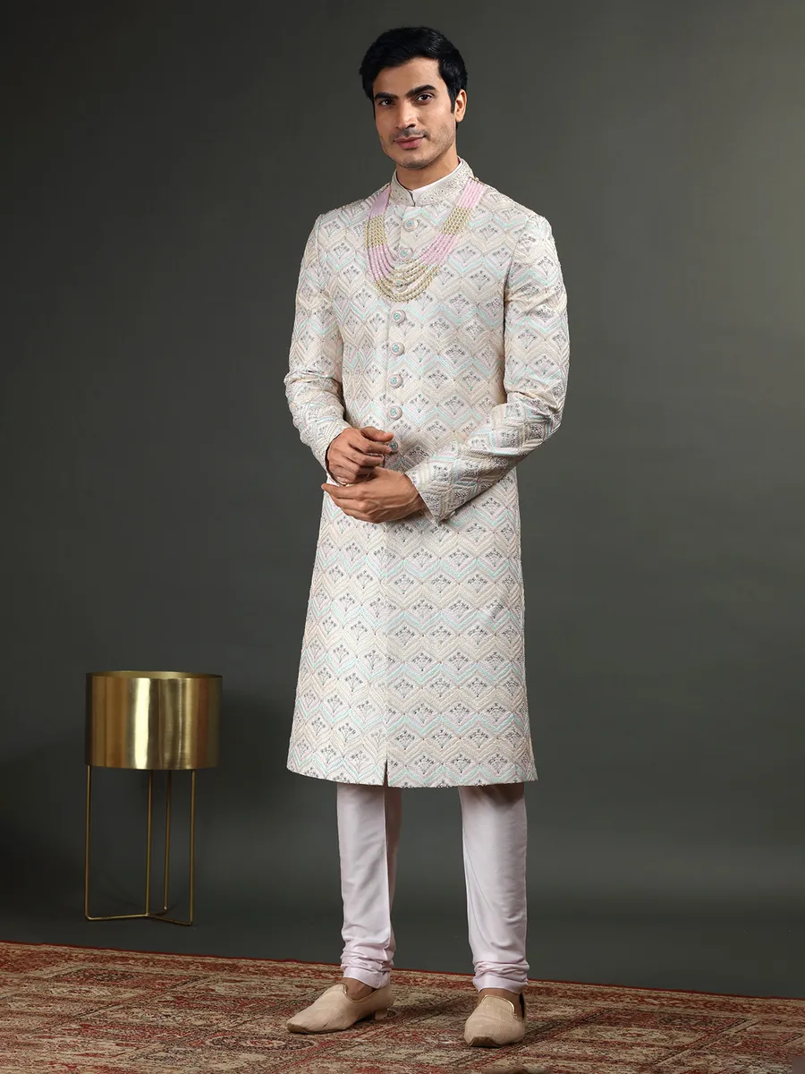 Lavish light pink raw silk sherwani