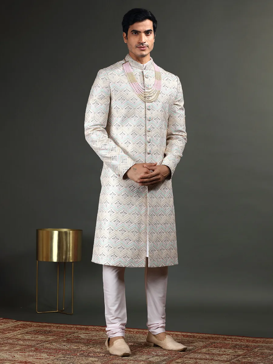 Lavish light pink raw silk sherwani