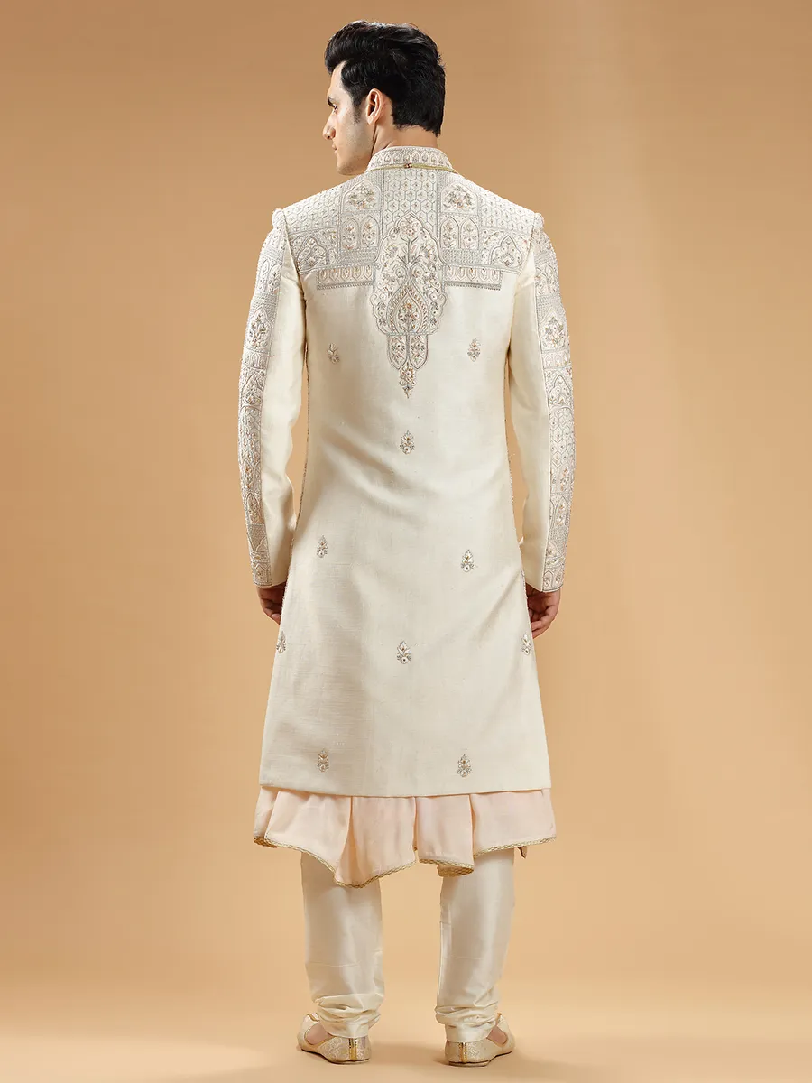 Light peach rich raw silk groom sherwani