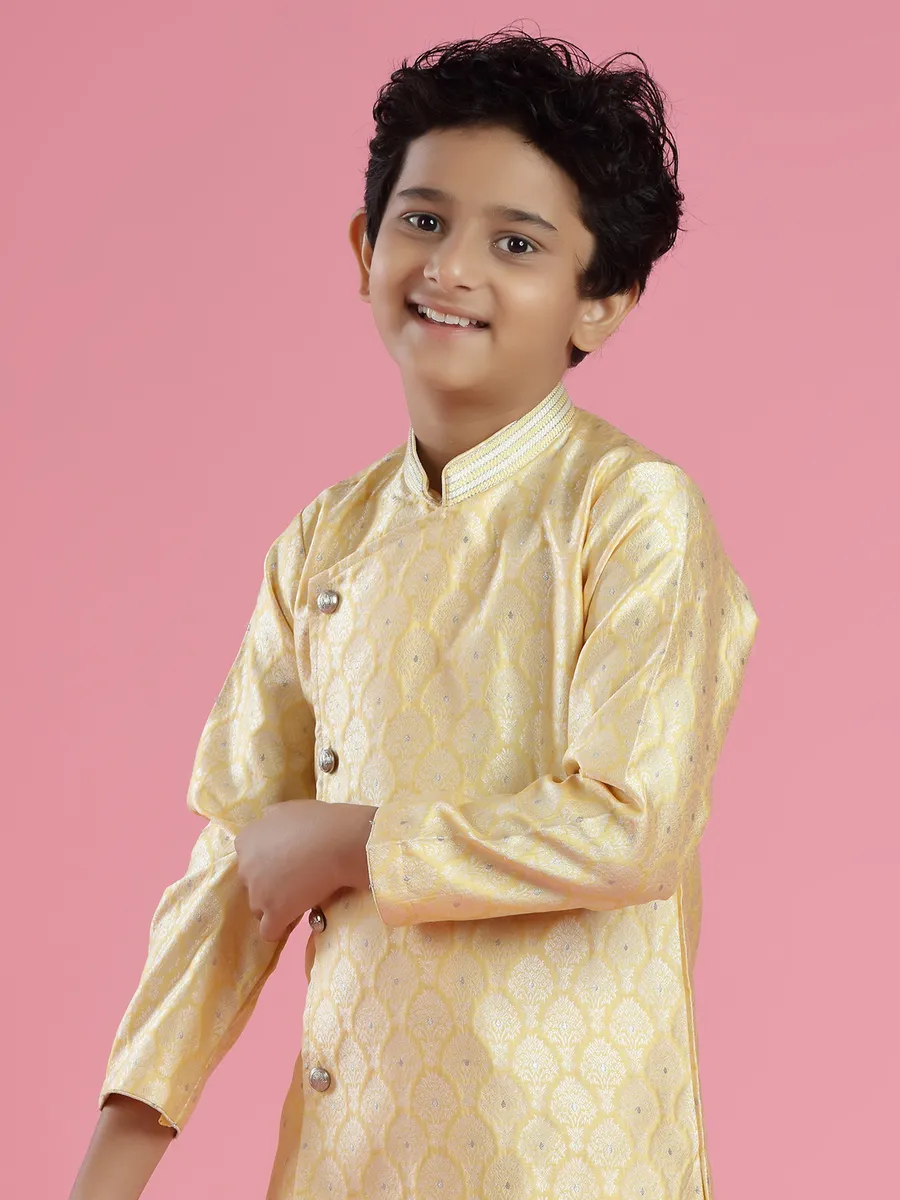 Light yellow festive look kurta suit in silk