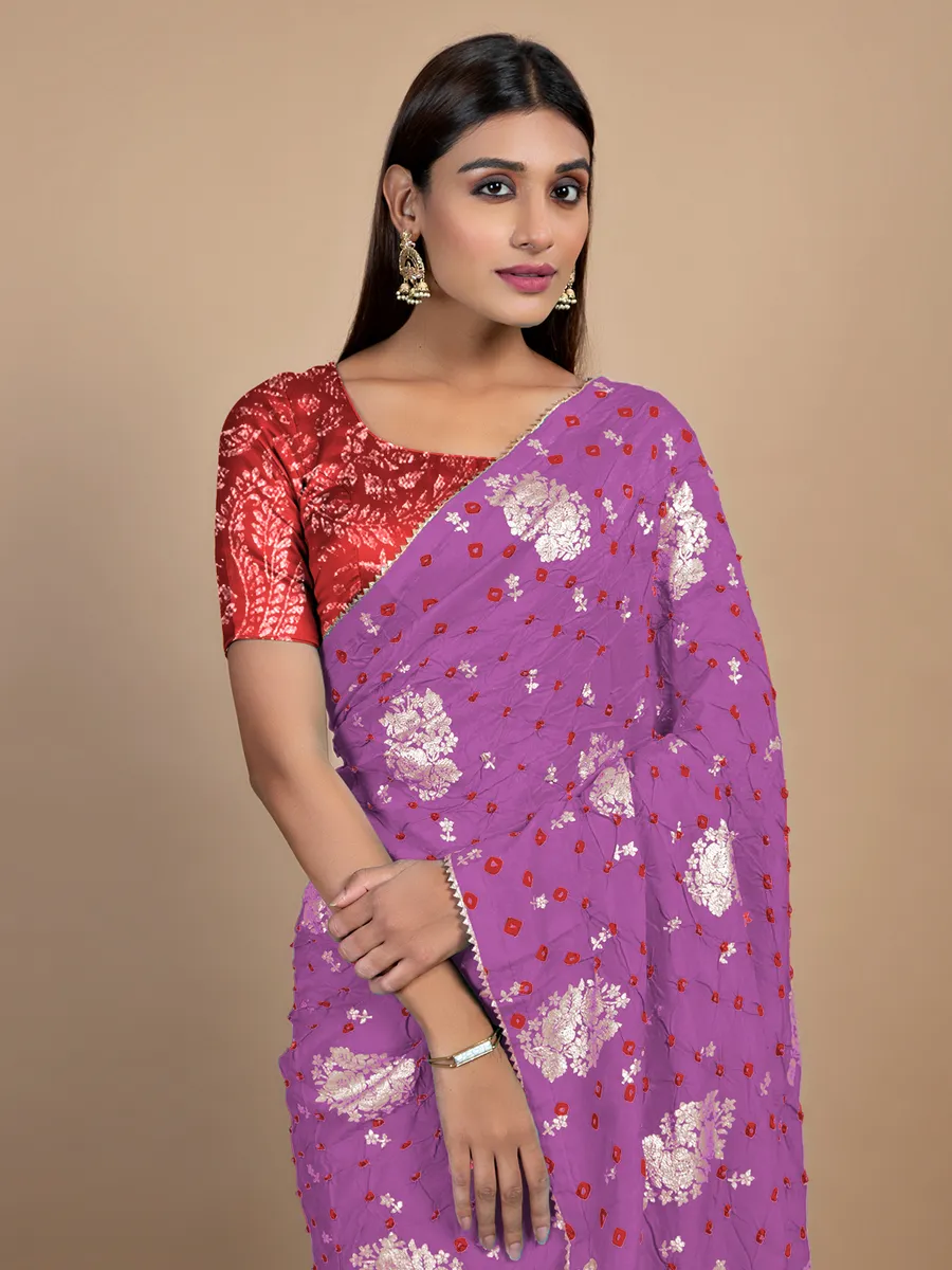 Mauve pink printed festive look bandhej saree