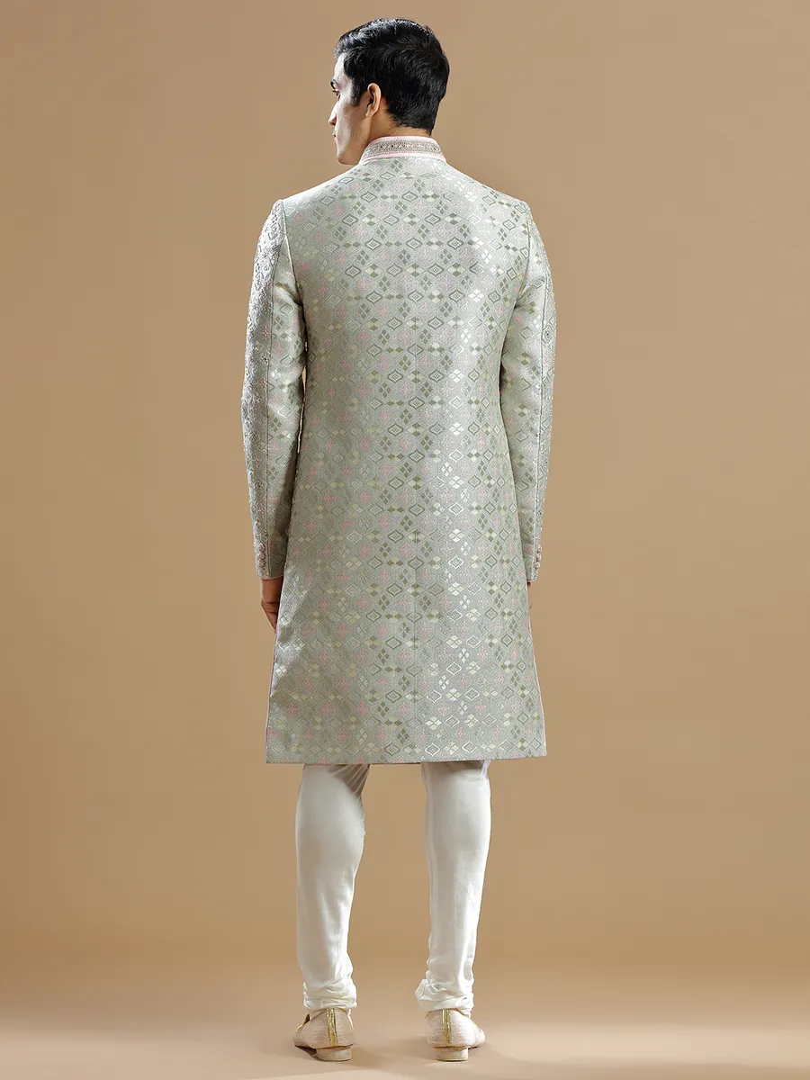 Mint green raw silk groom wear sherwani