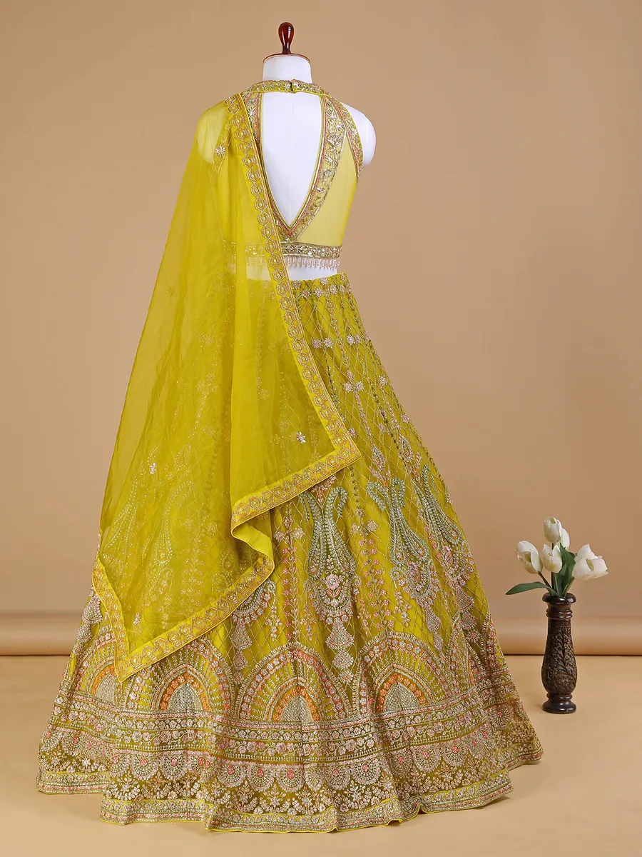 Mustard yellow net wedding lehenga choli