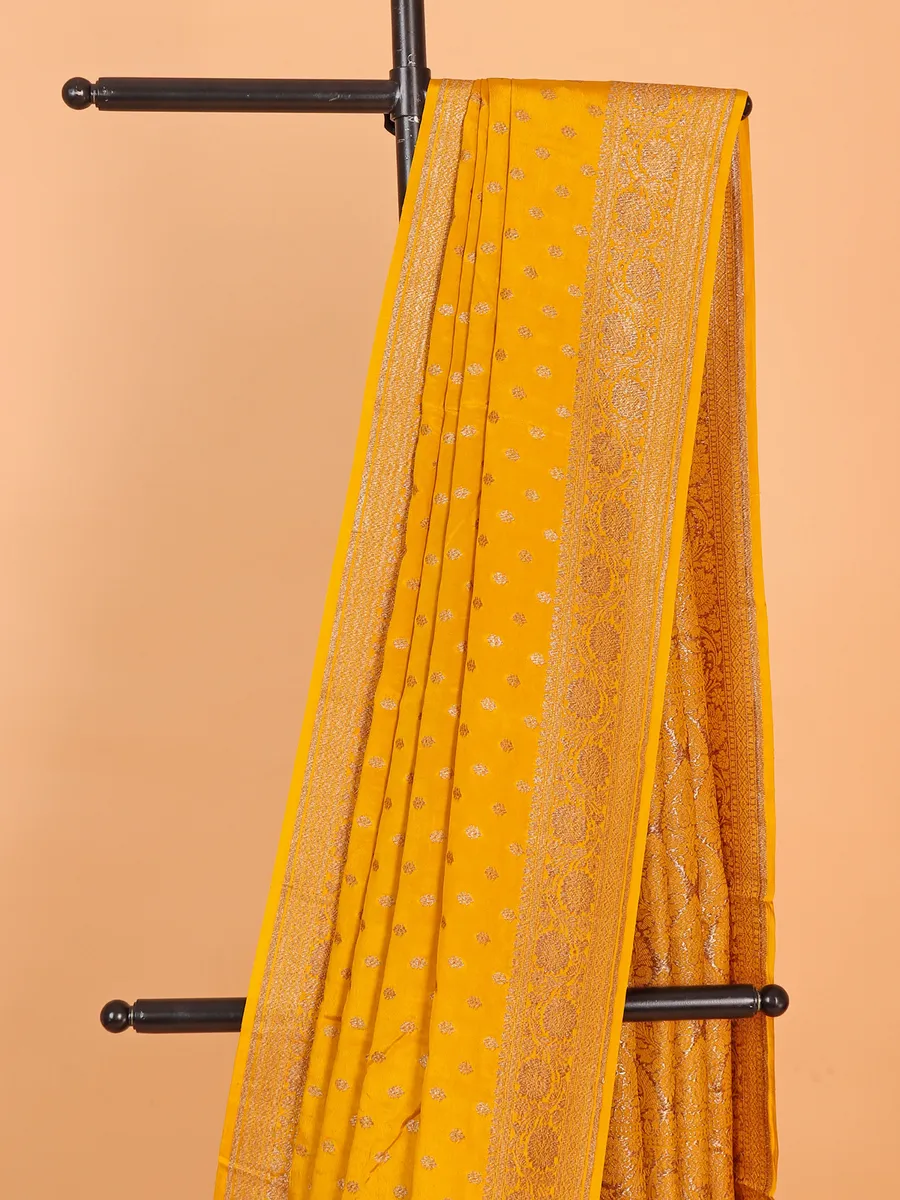 Mustard yellow silk saree with contrast blouse