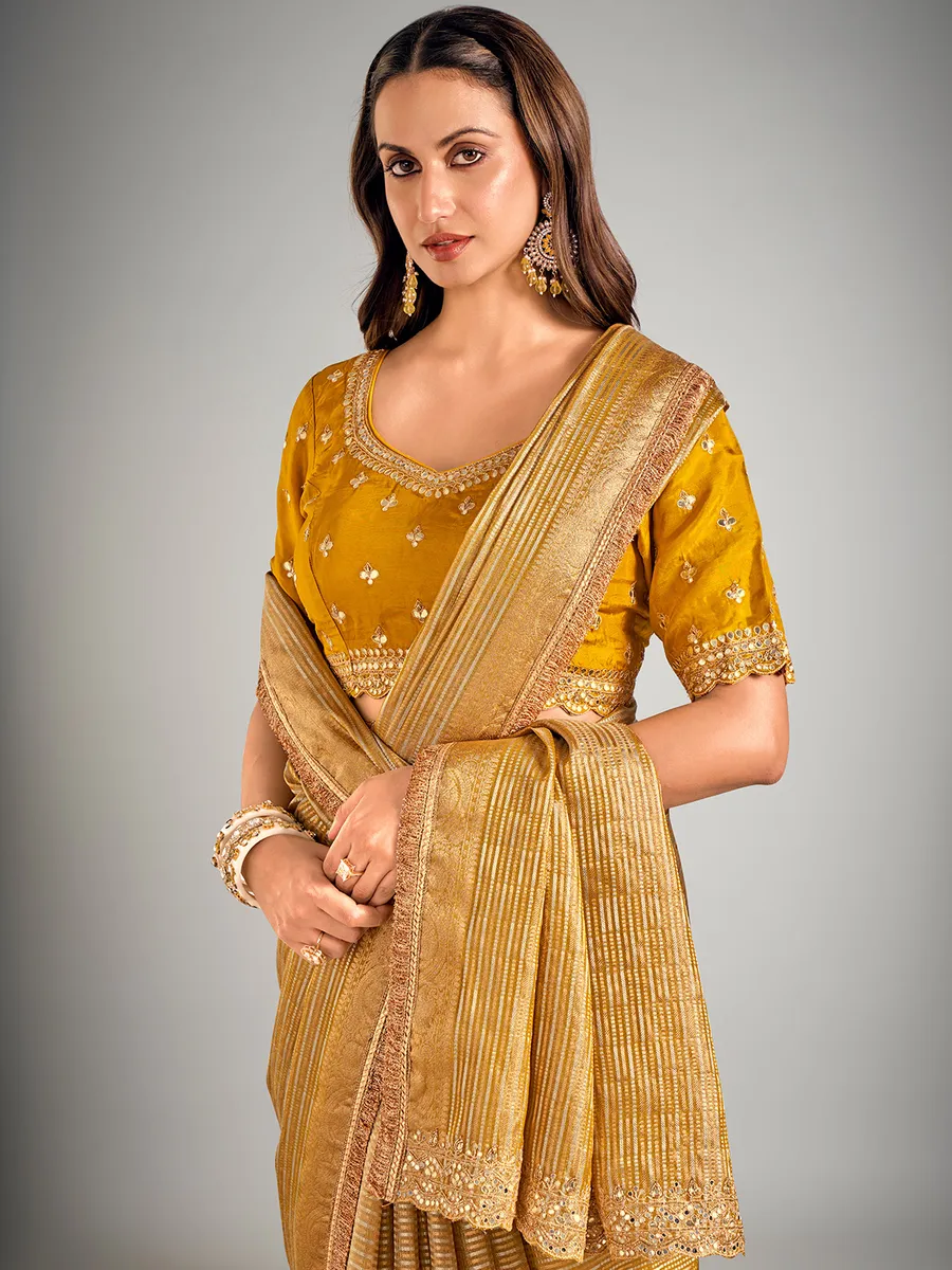 Mustard yellow tissue silk zari weaving saree