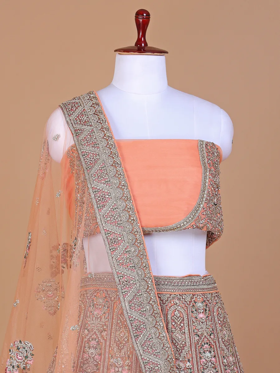 Net peach embroidery lehenga choli