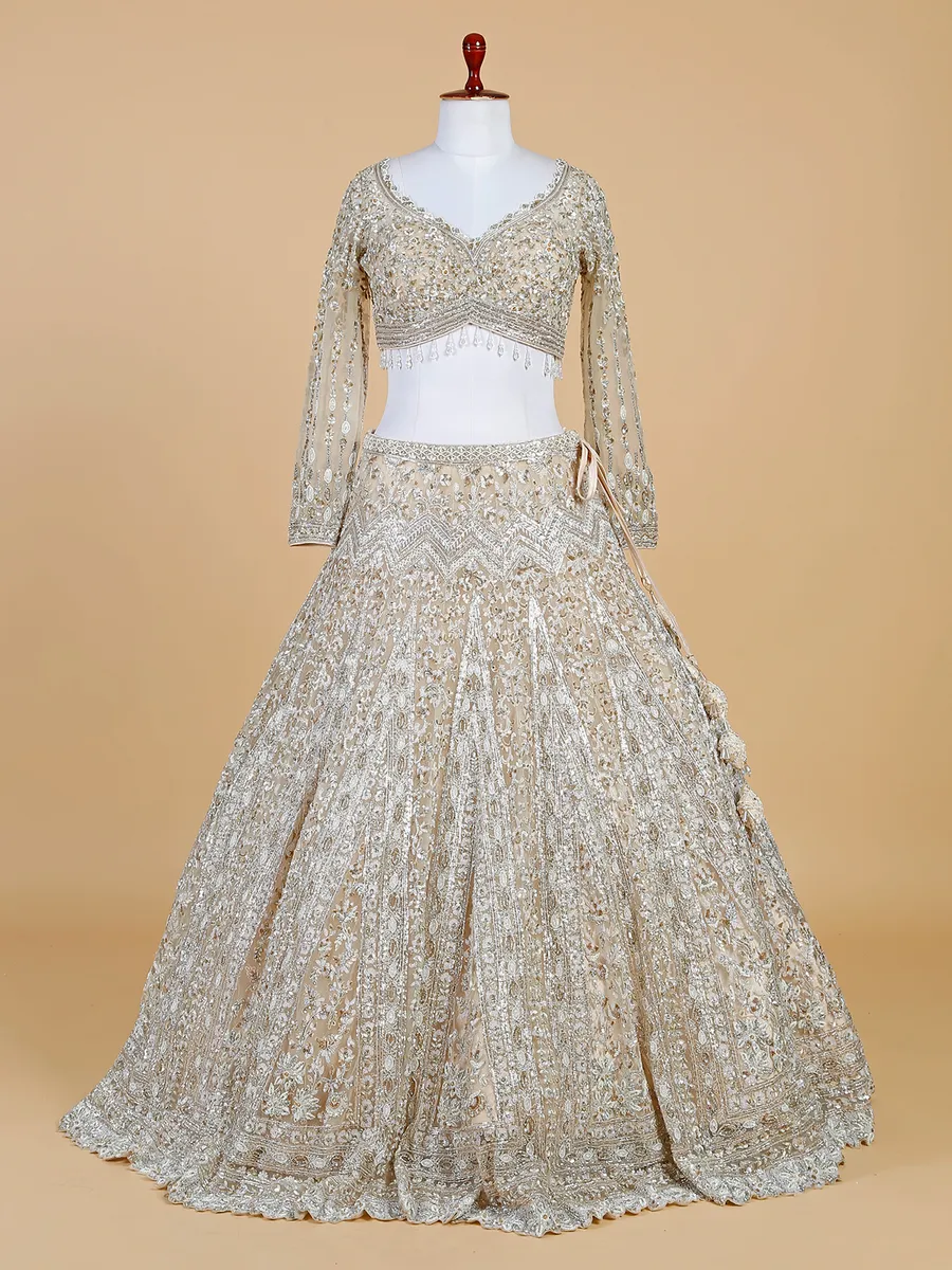 Off white net lehenga choli for bridal