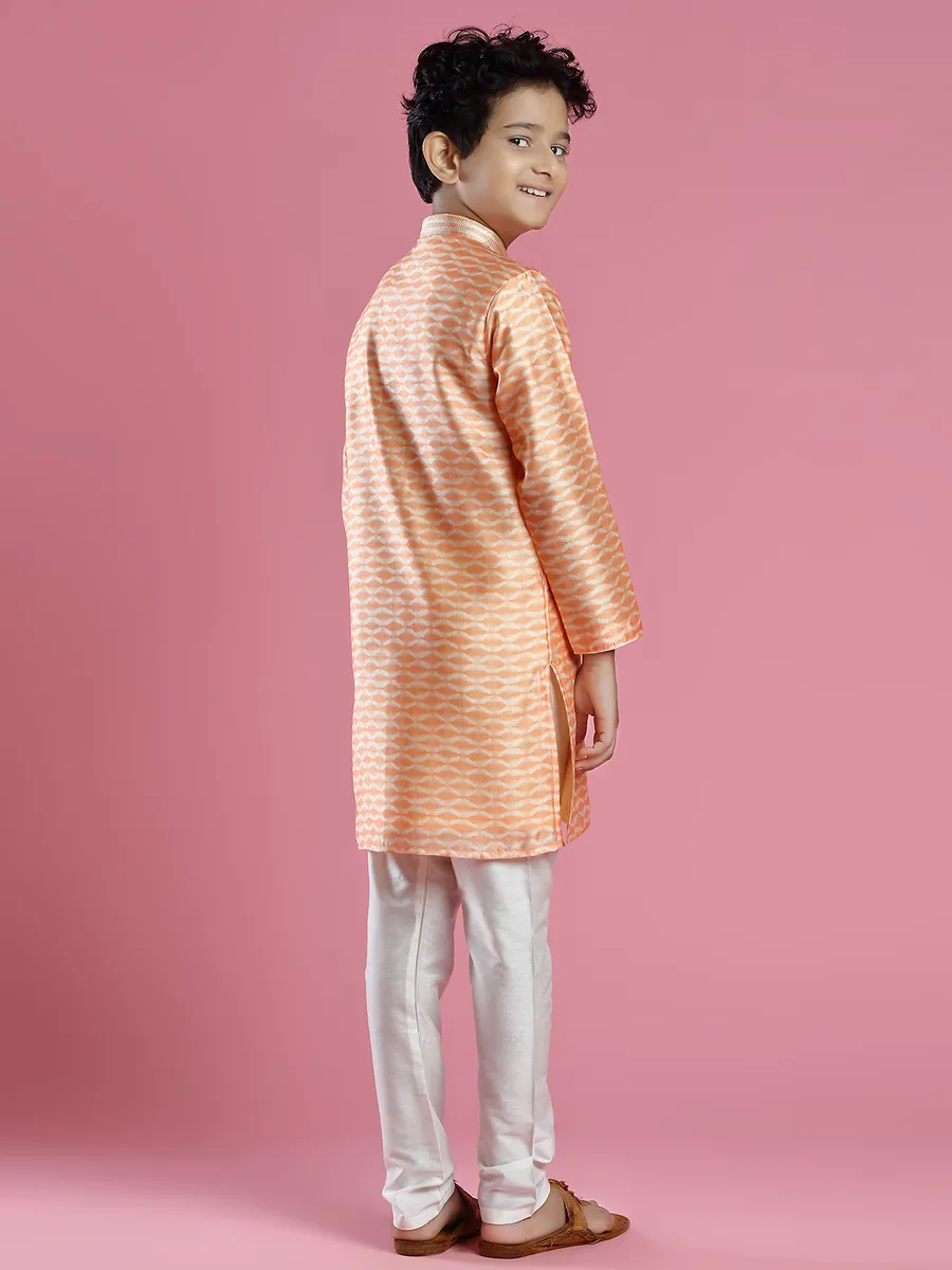 Orange printed festive wear kurta suit in silk