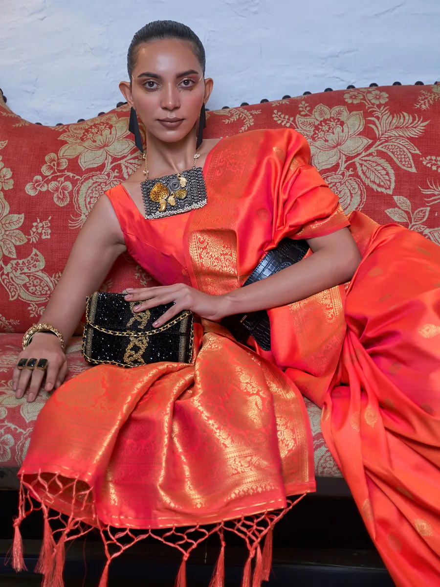 Orange silk saree with zari weaving