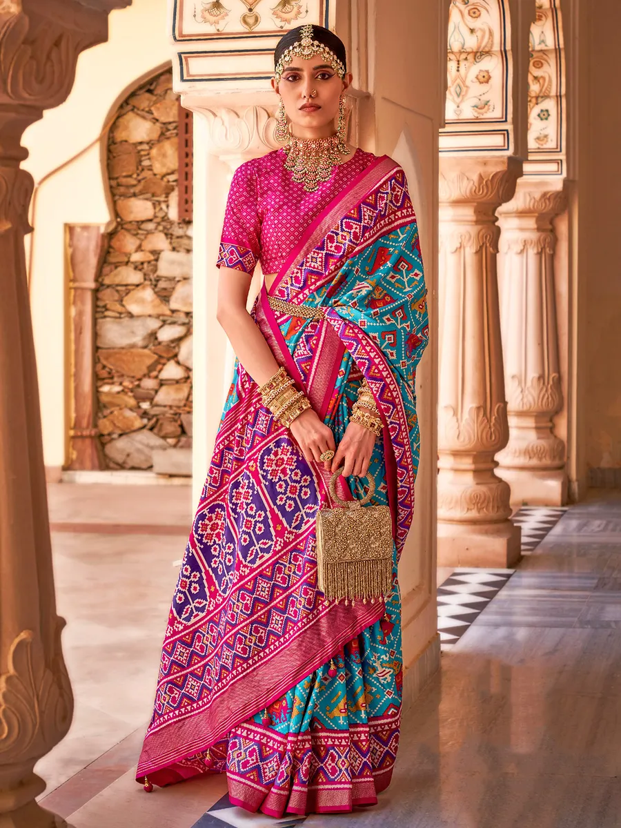 Patola printed aqua silk saree