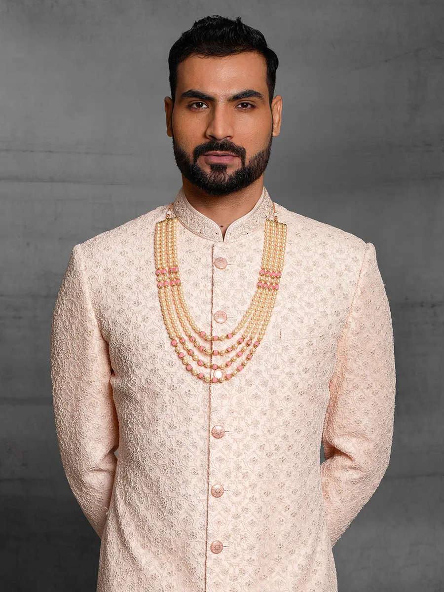 Peach color silk sherwani for wedding events