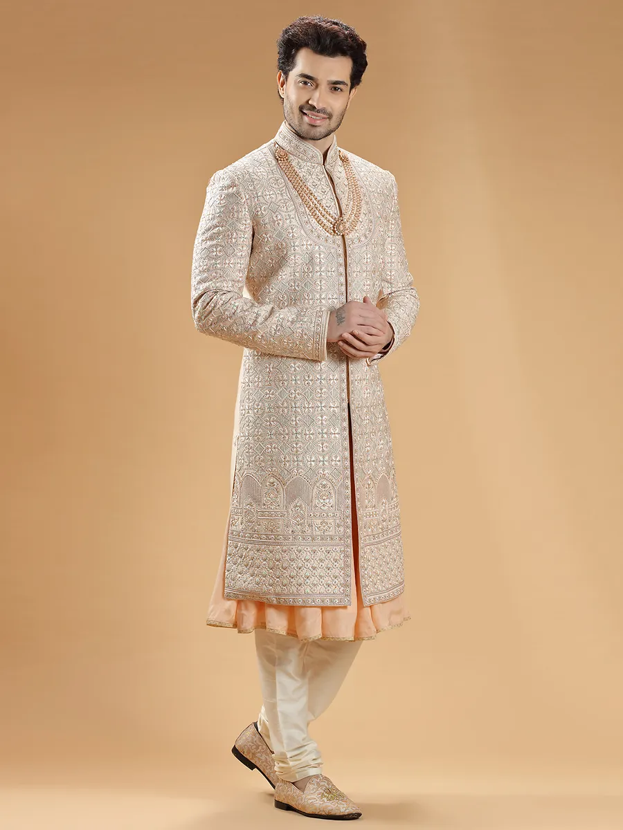 Peach lavish groom sherwani in raw silk