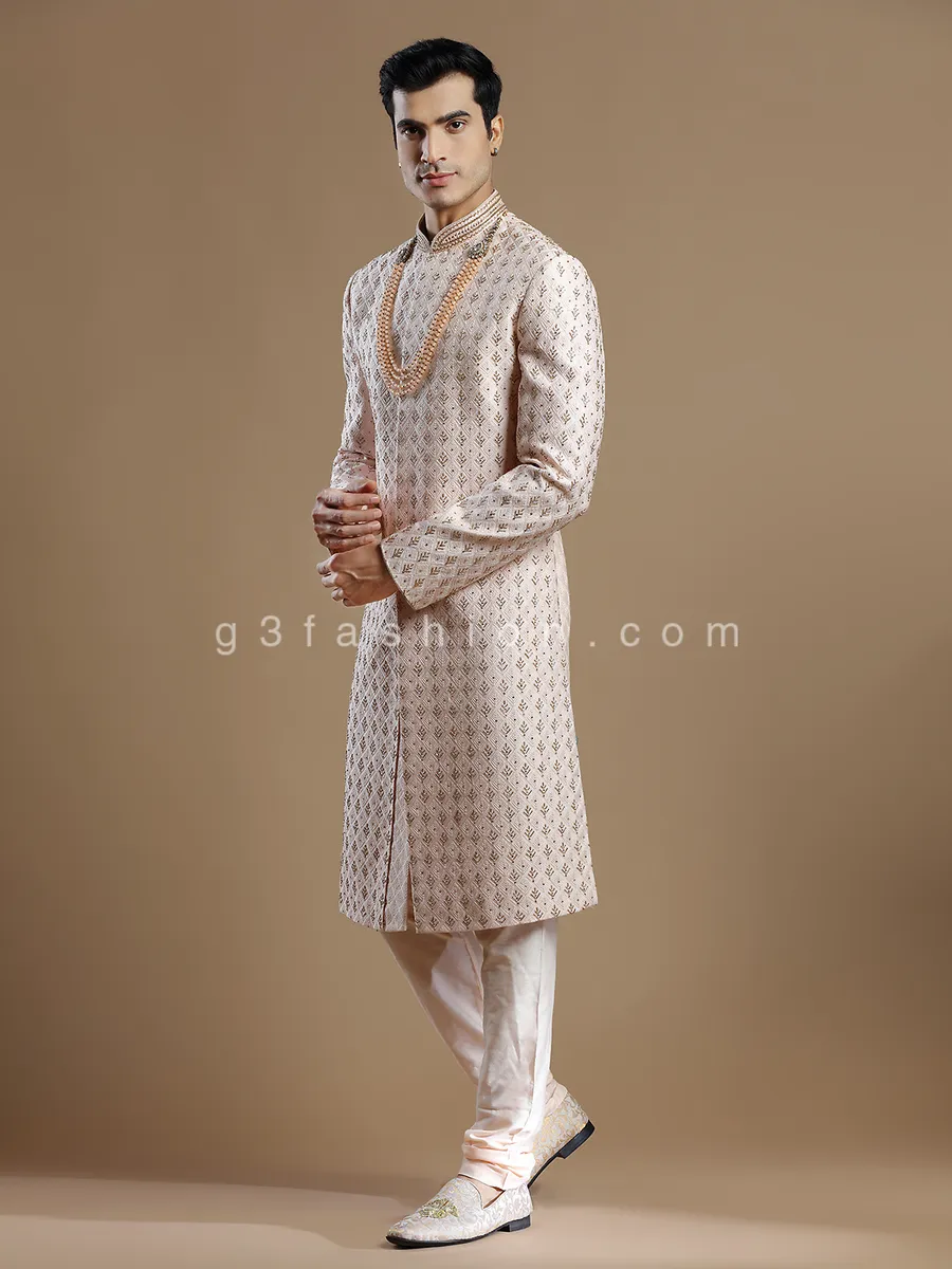 Peach lavish groom wear sherwani in raw silk