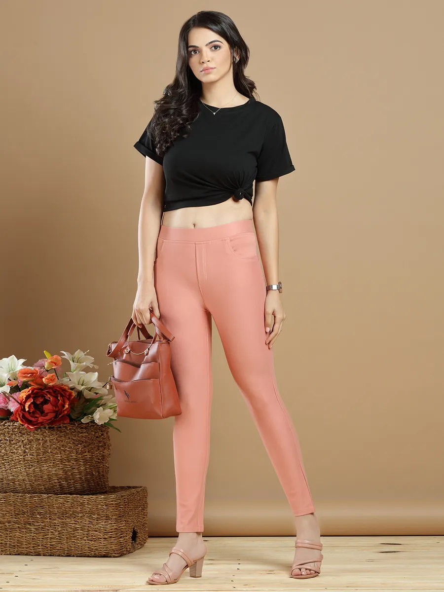 Peach plain jeggings for womens in lycra