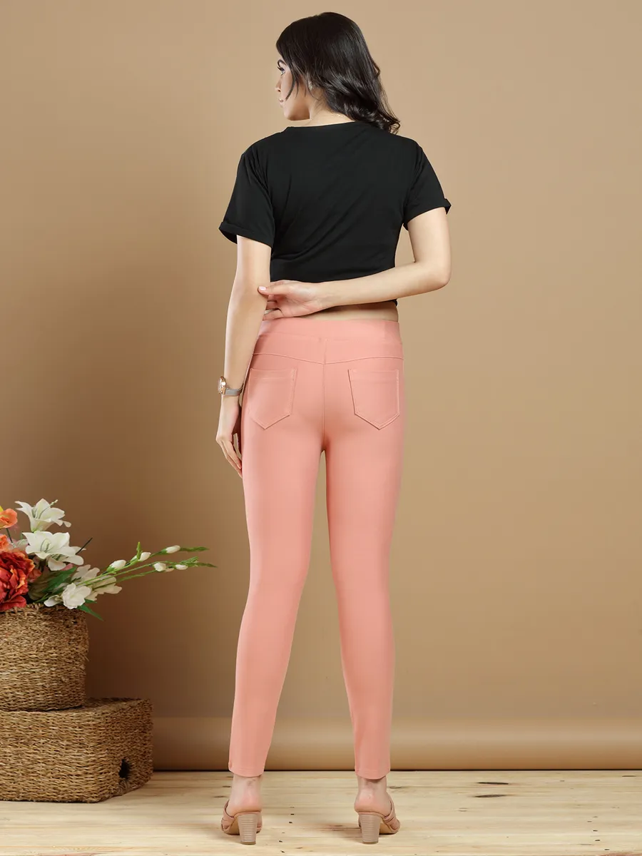 Peach plain jeggings for womens in lycra