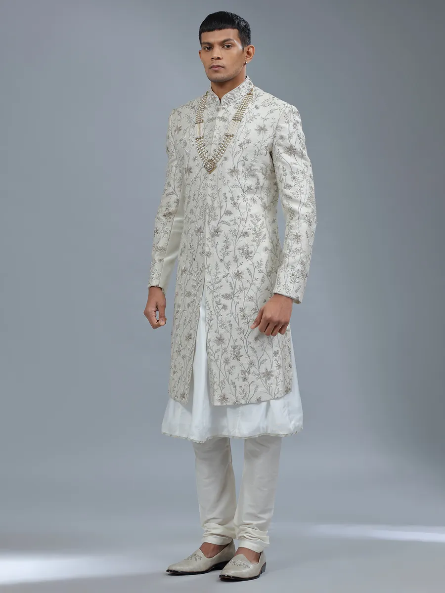 Peshwai style off white raw silk shewani for groom