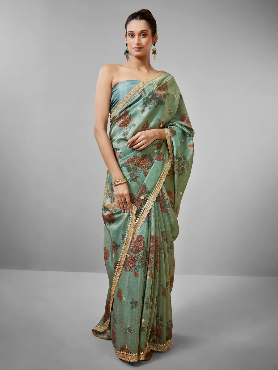 Pista green floral printed tissue silk saree