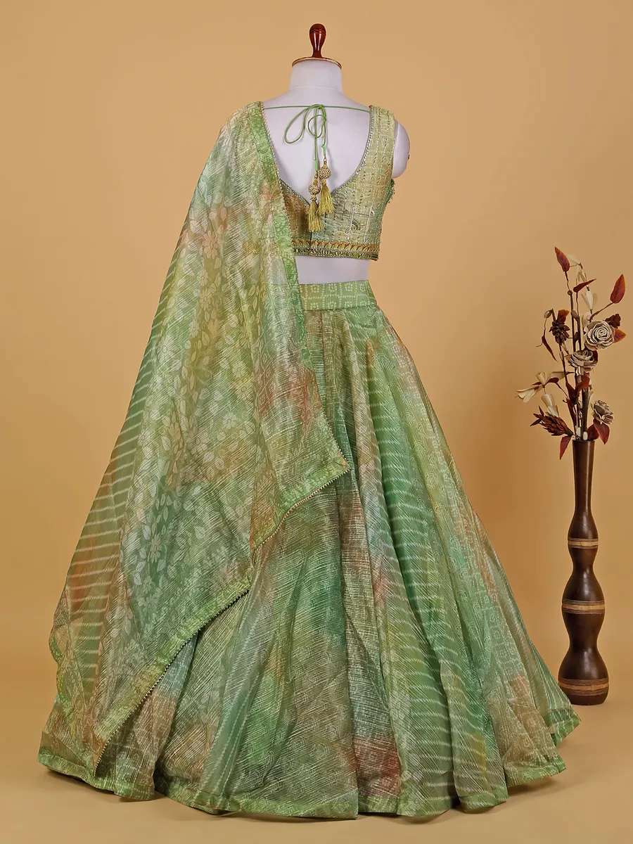 Pista green printed organza lehenga choli