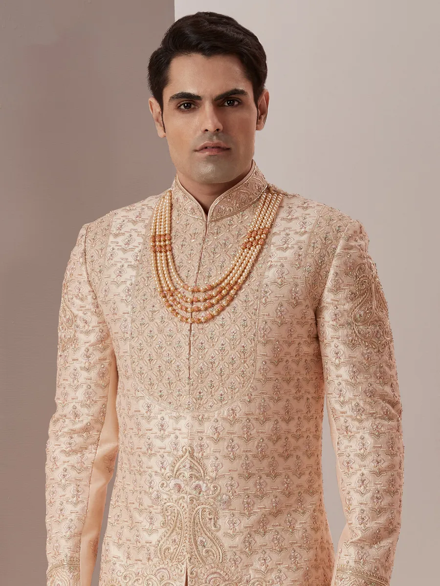 Powder pink rich raw silk groom wear sherwani