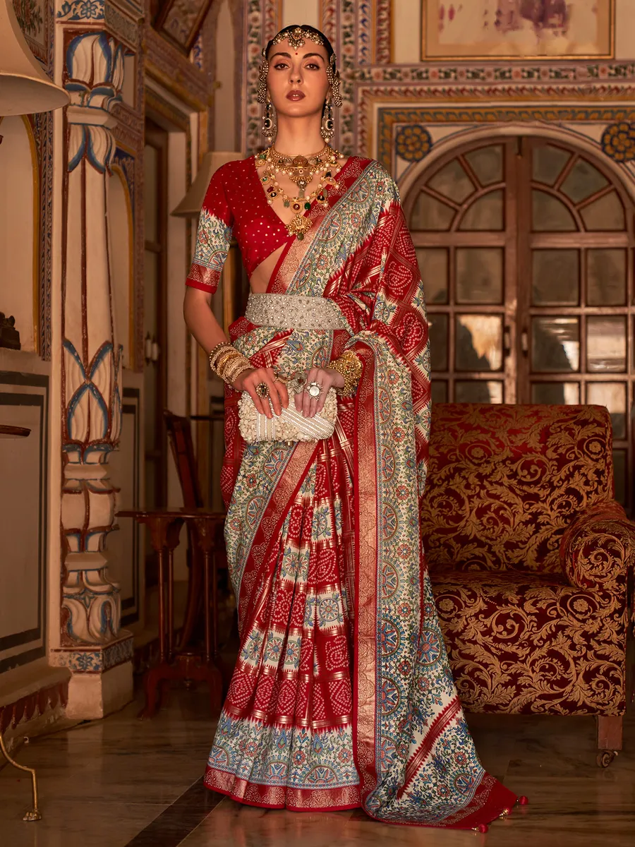 Printed red saree with swarovski border