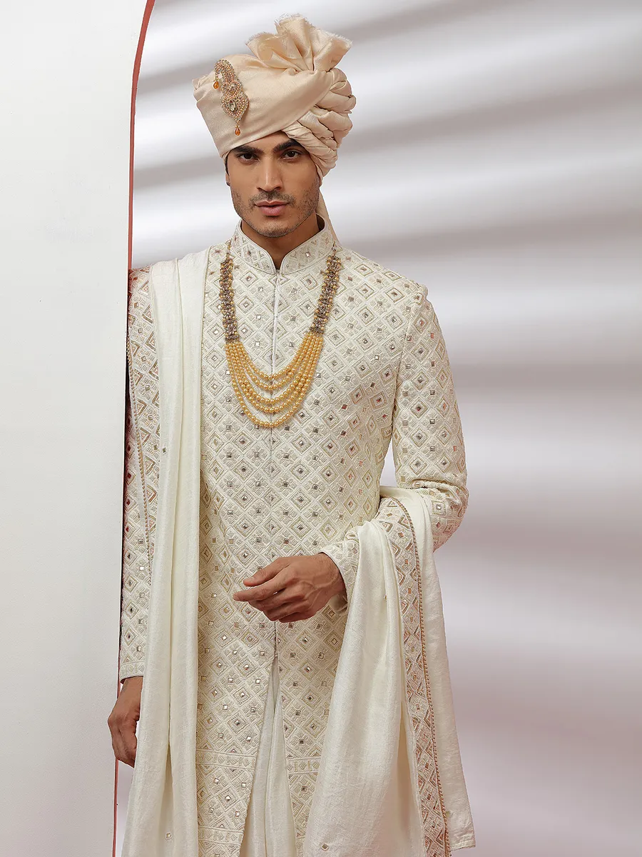 Raw silk cream color groom and wedding sherwani