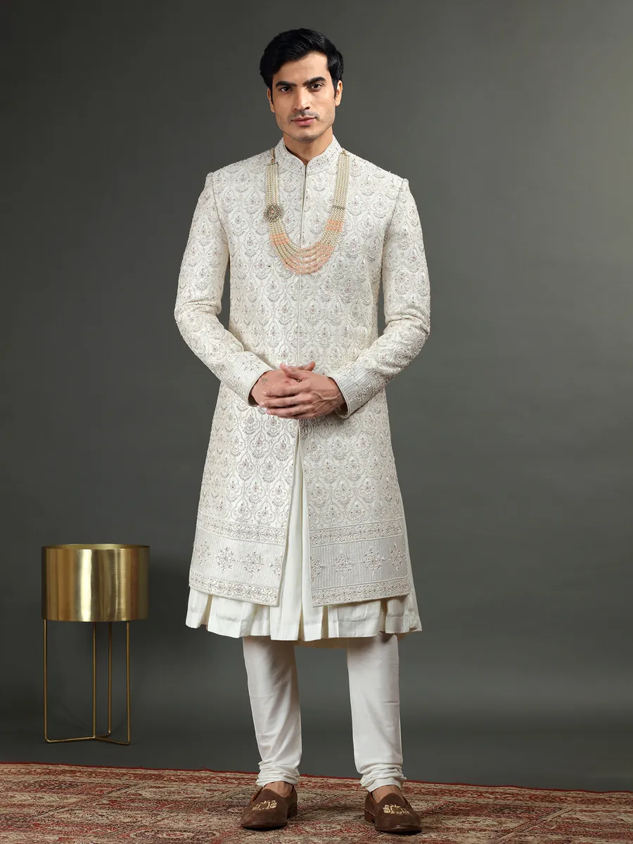 Raw silk groom sherwani in off white