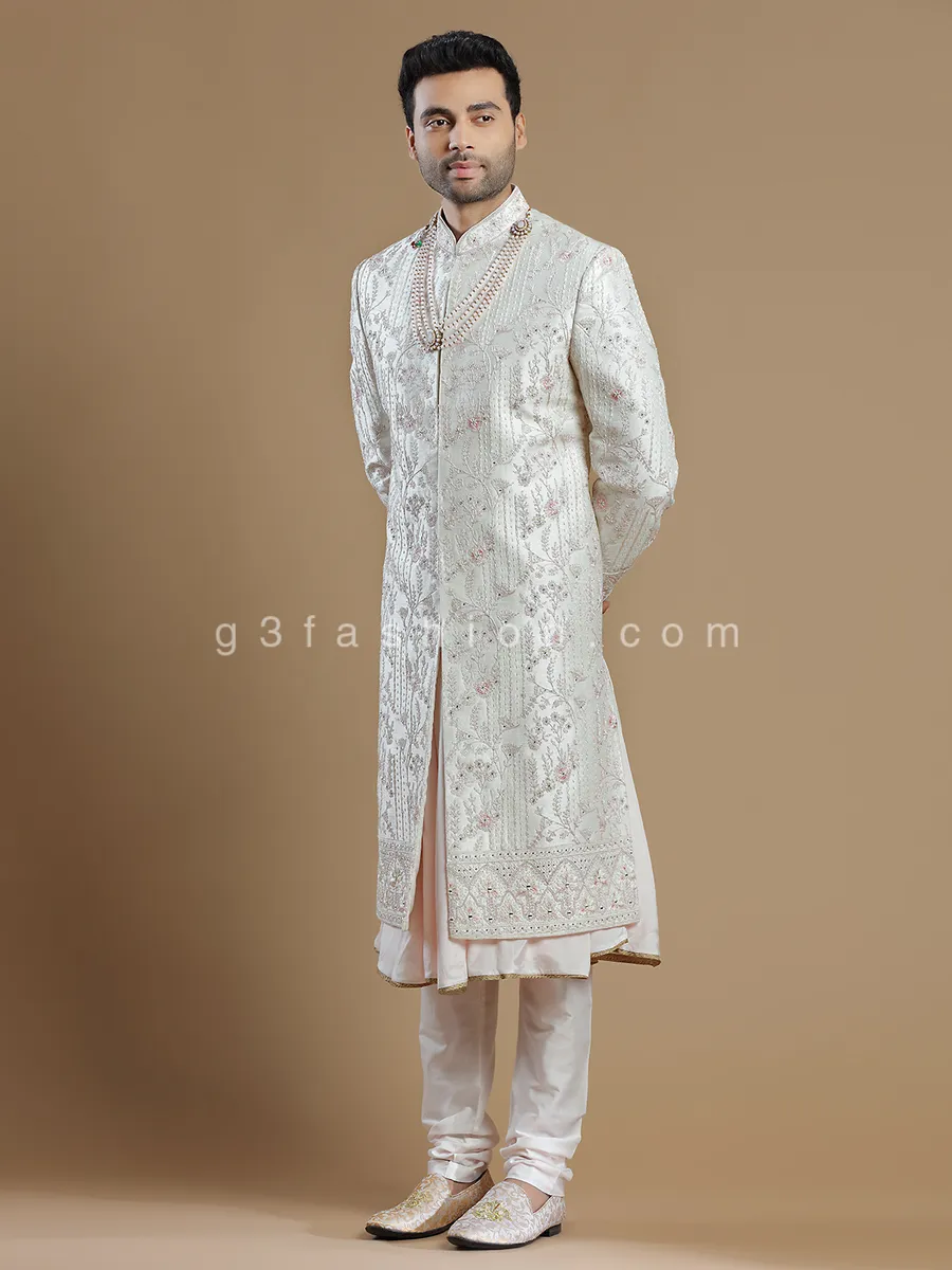 Raw silk groom wear sherwani in off white color
