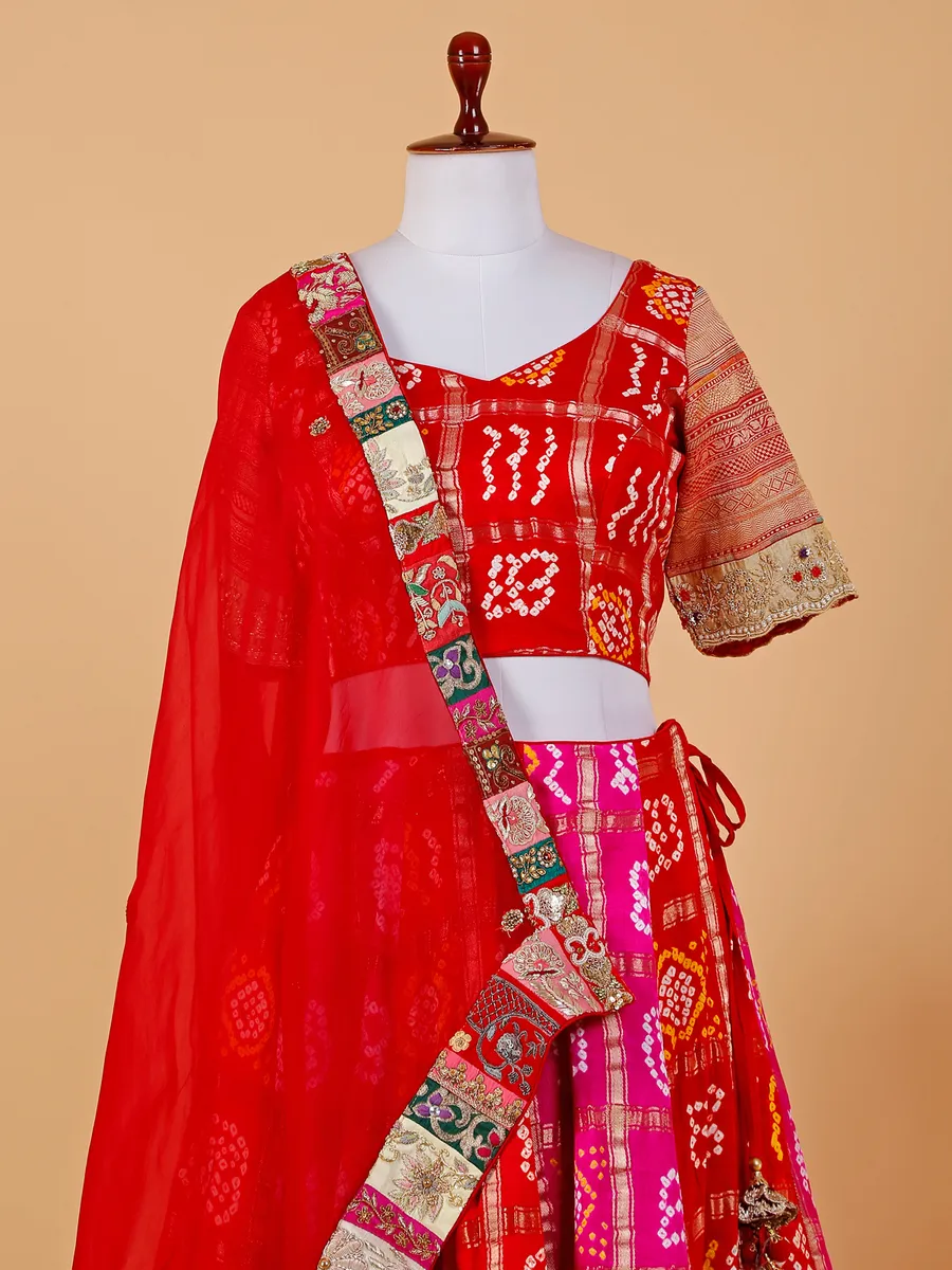 Red and magenta bandhej lehenga choli