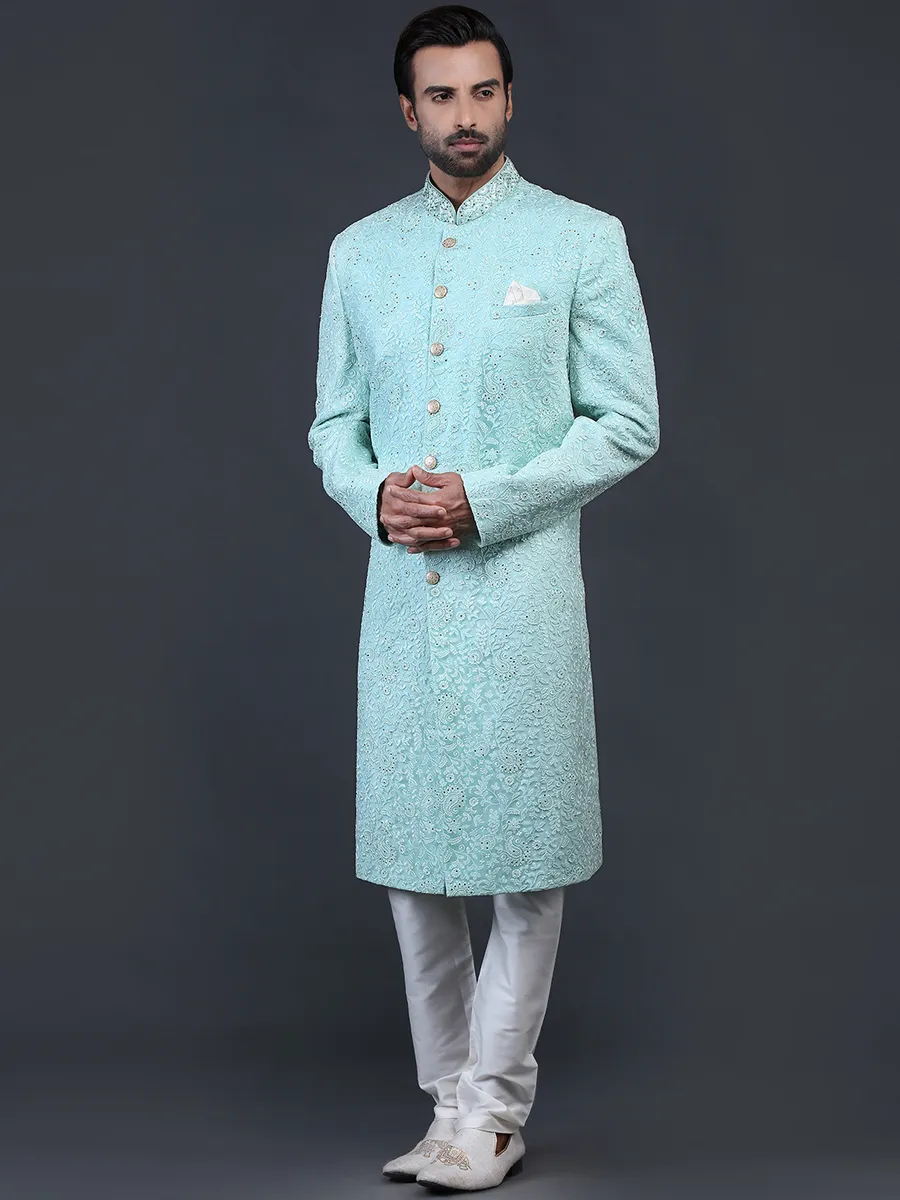 Sea green net fabric sherwani for wedding occasions