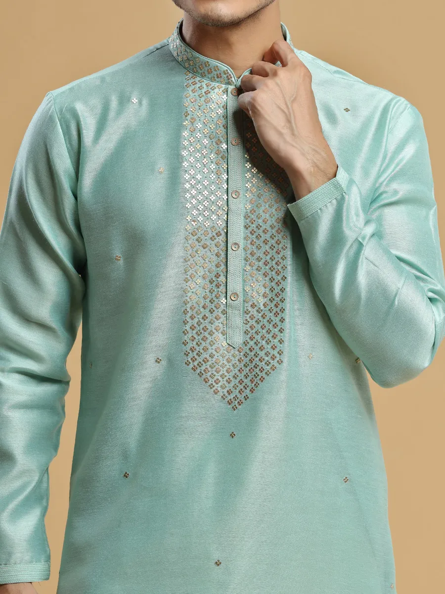 Sea green silk kurta suit for festive look