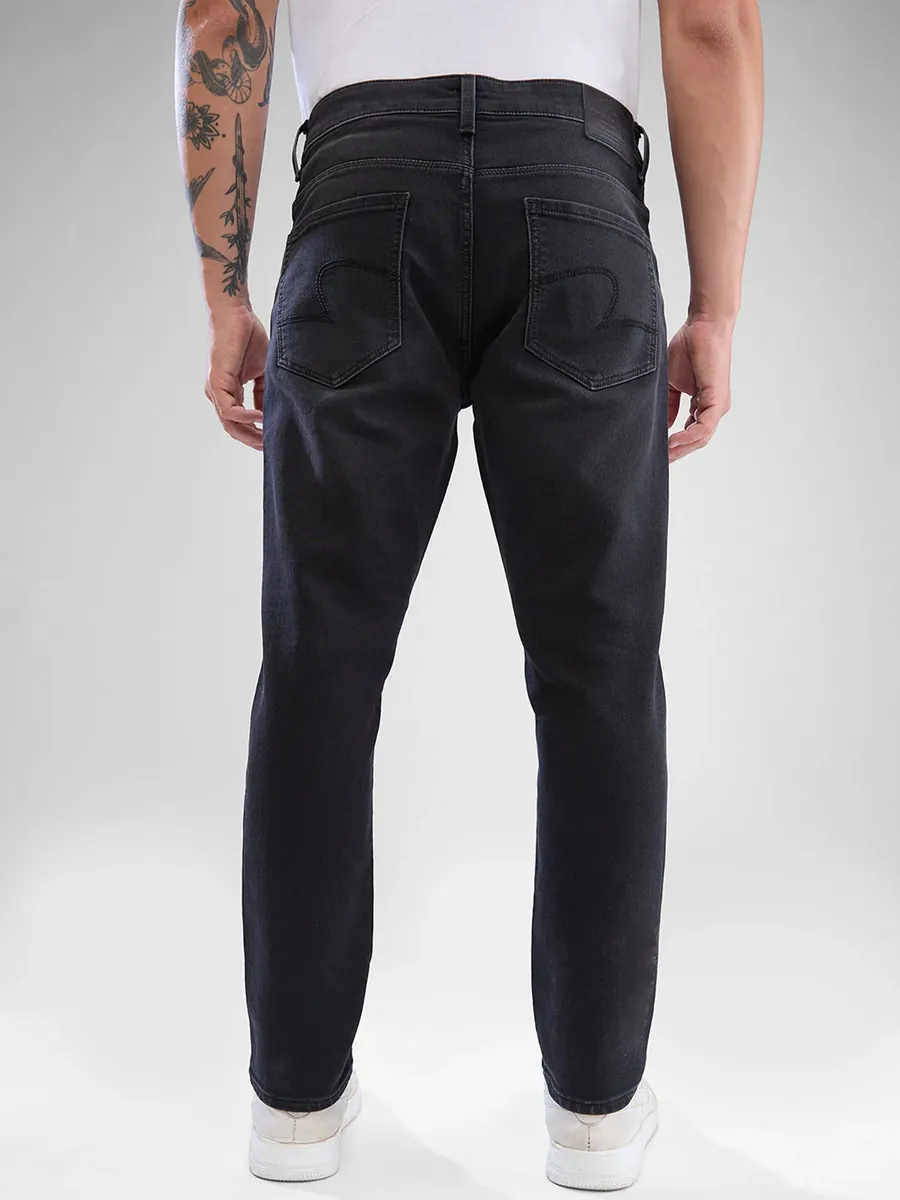 SPYKAR solid black denim jeans for men