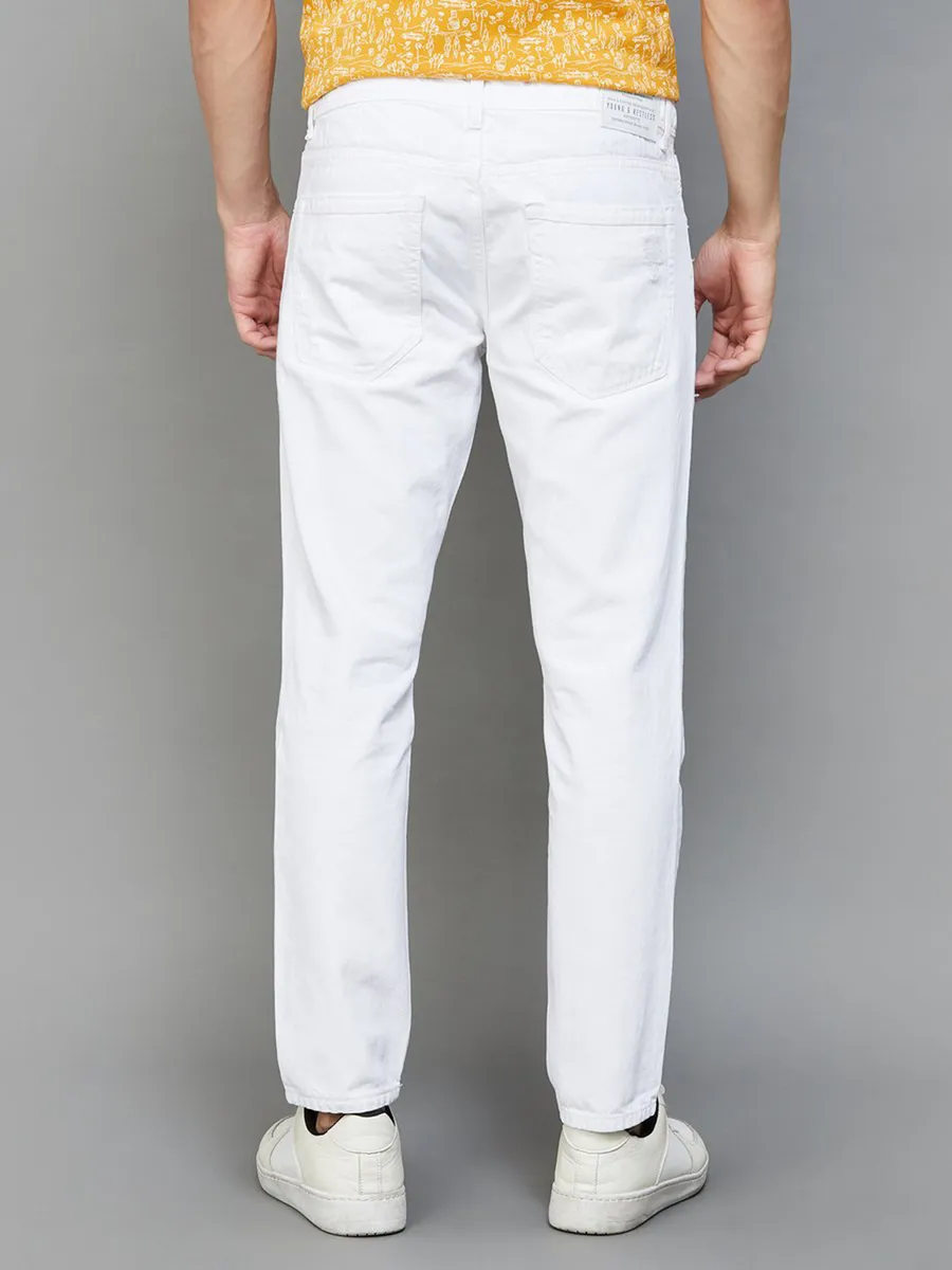 Spykar white ripped slim tapered fit jeans