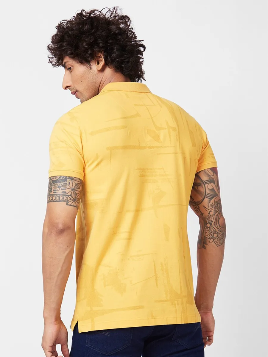 Spykar yellow printed polo t shirt