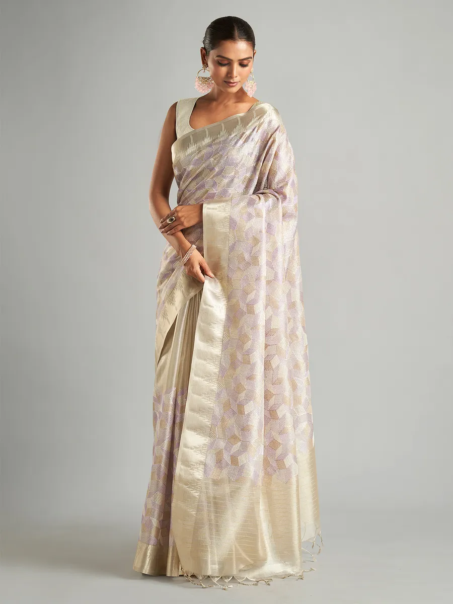 Stunning off-white tissue silk saree