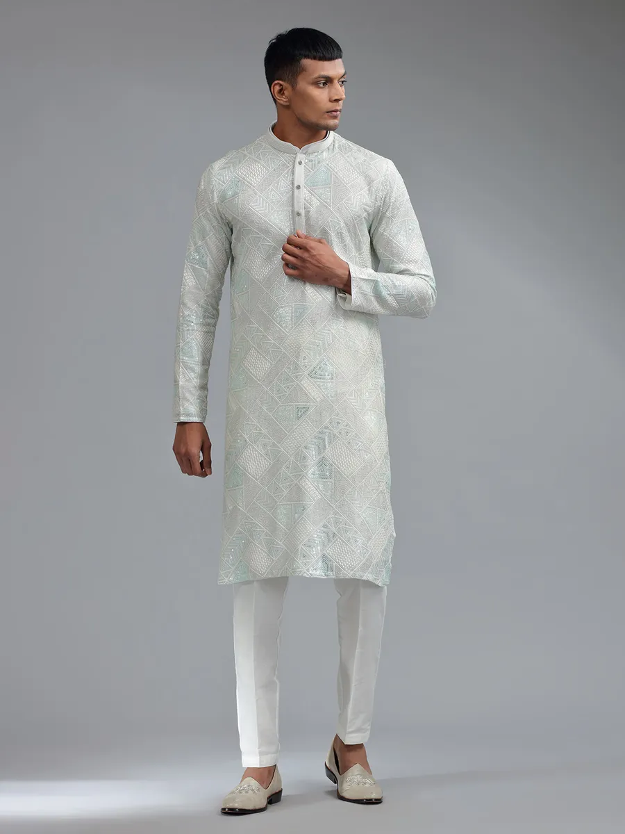 Stunning sea green silk kurta suit