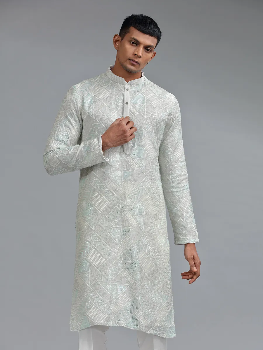 Stunning sea green silk kurta suit