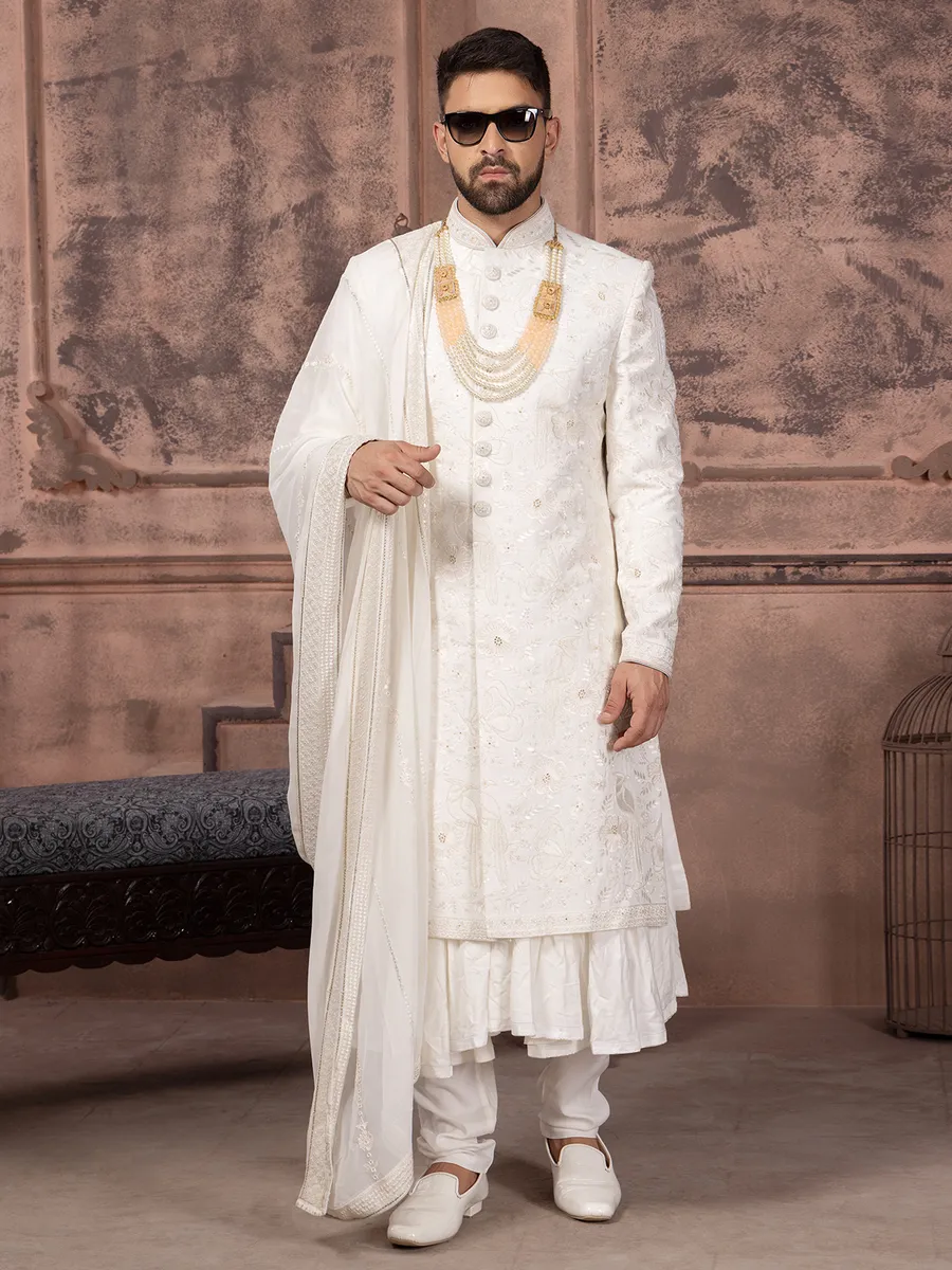 Stunning silk white groom sherwani