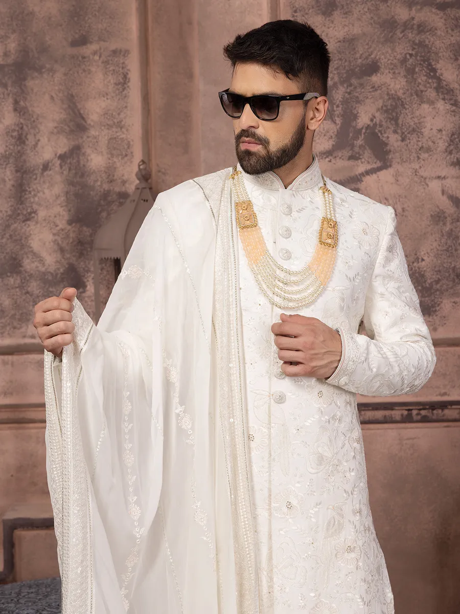 Stunning silk white groom sherwani